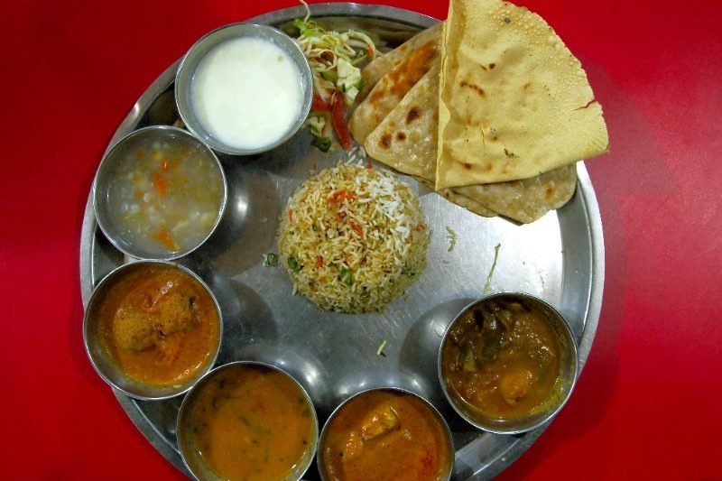 South Indian thali with several small dishes